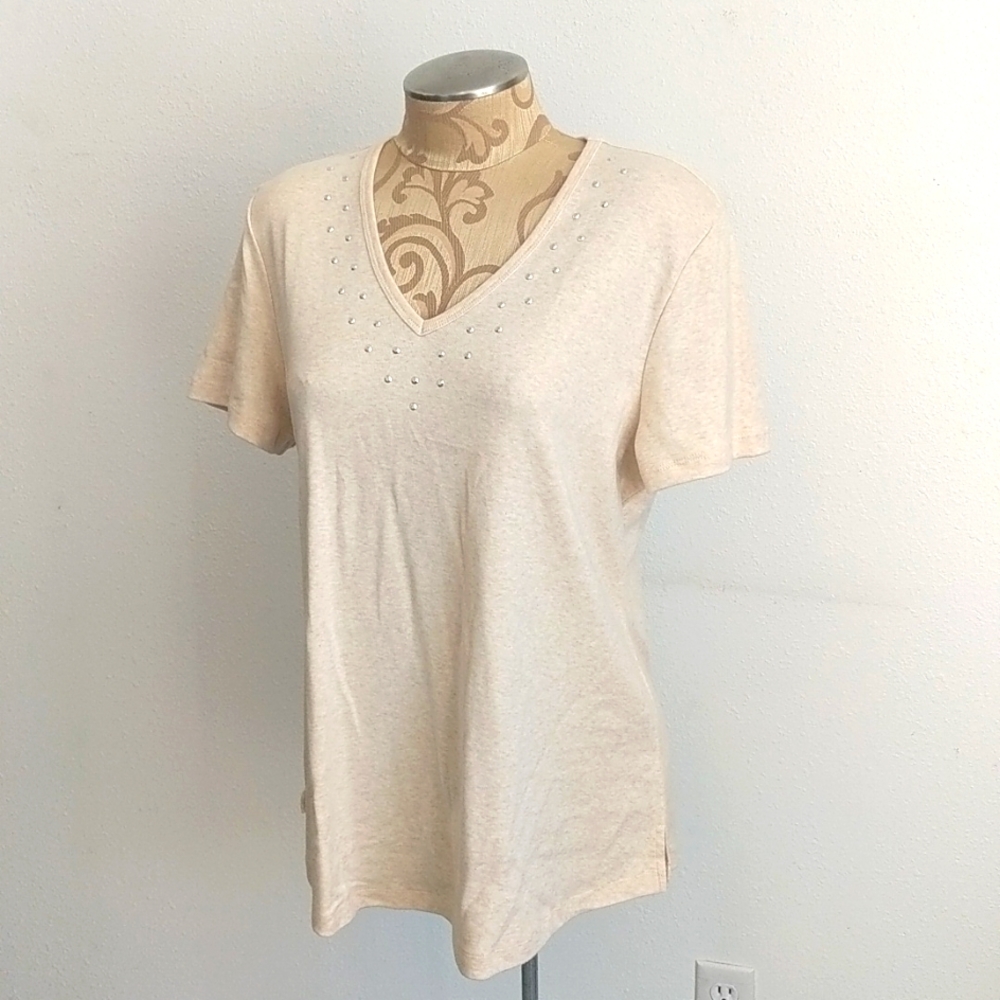 100% cotton V-Neck top with silver embellishments at neck
